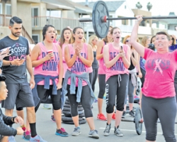Businesses raise $1,800 for breast cancer research