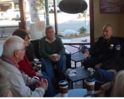 Police chief and Councilwoman Deaton chat at Javatinis