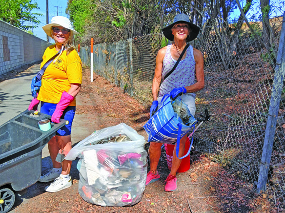 LW Lions Club teams up to clean local bike trail